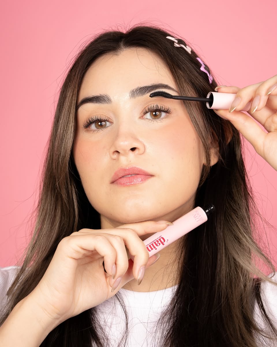 A collection of vibrant and shimmering makeup products for festive looks