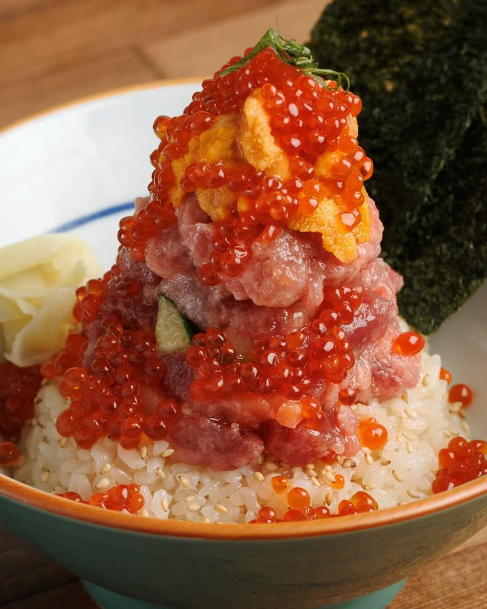 MUKAI premium seafood bowl with ikura, cucumber and egg yolk