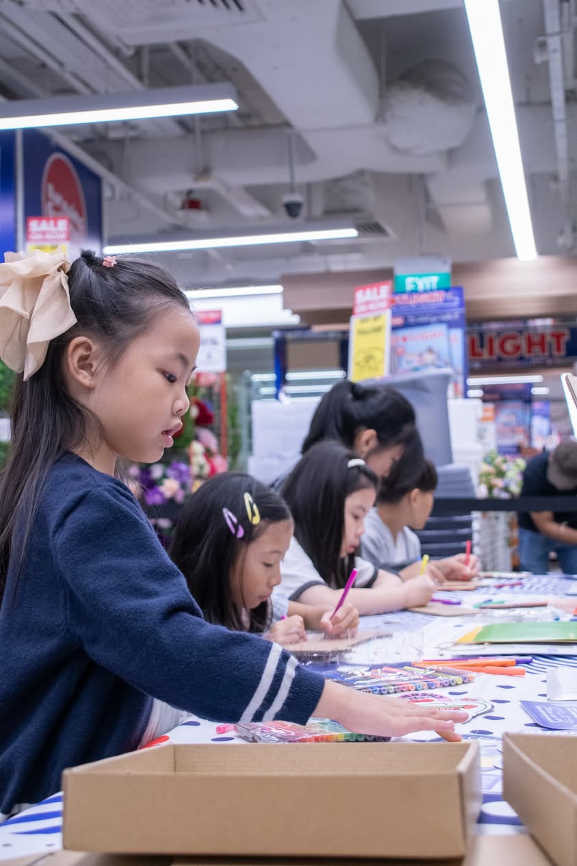 Kids engaged in crafting eco-conscious toys with concentration