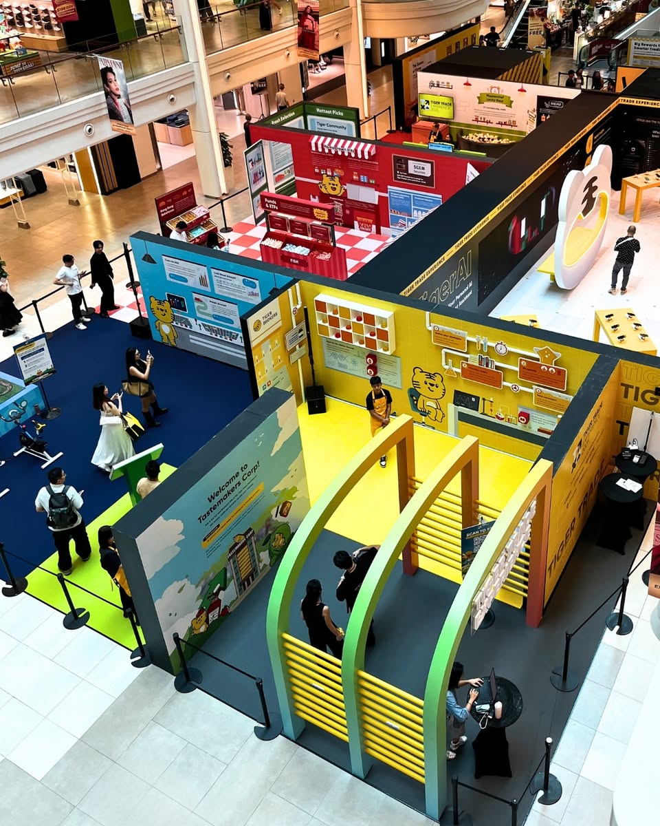 Attendees exploring interactive zones at the Tiger Trade Experience event.
