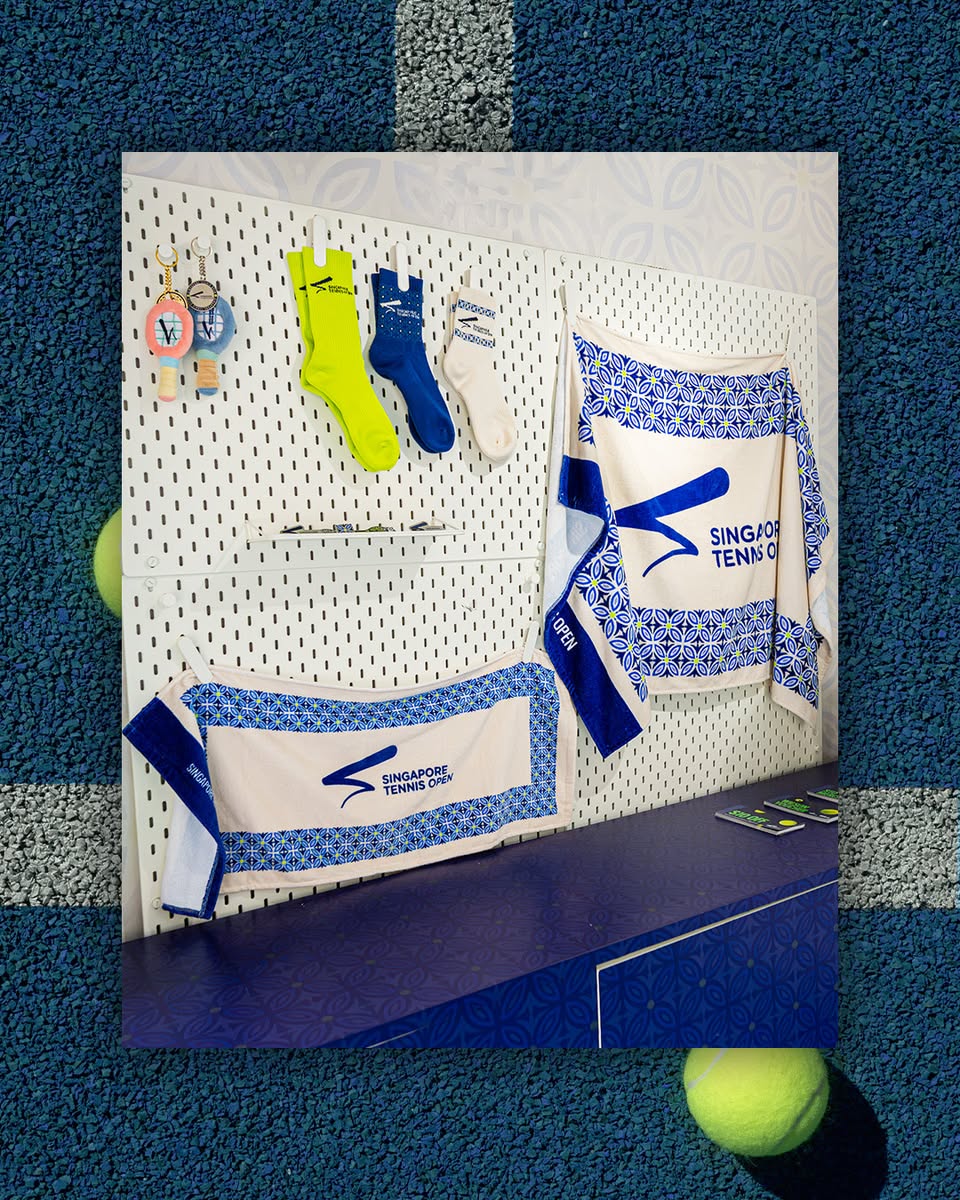 Singapore Tennis Open branded merchandise including socks, towels and keychains