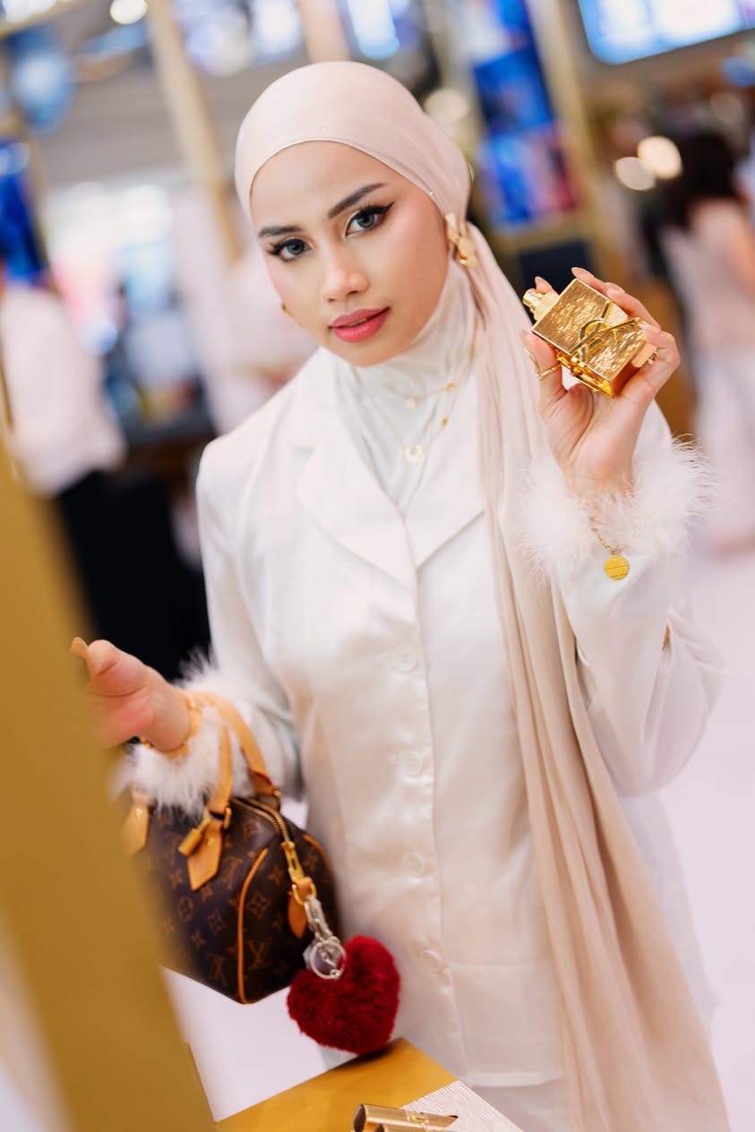 Engaged attendees participating in a beauty masterclass session
