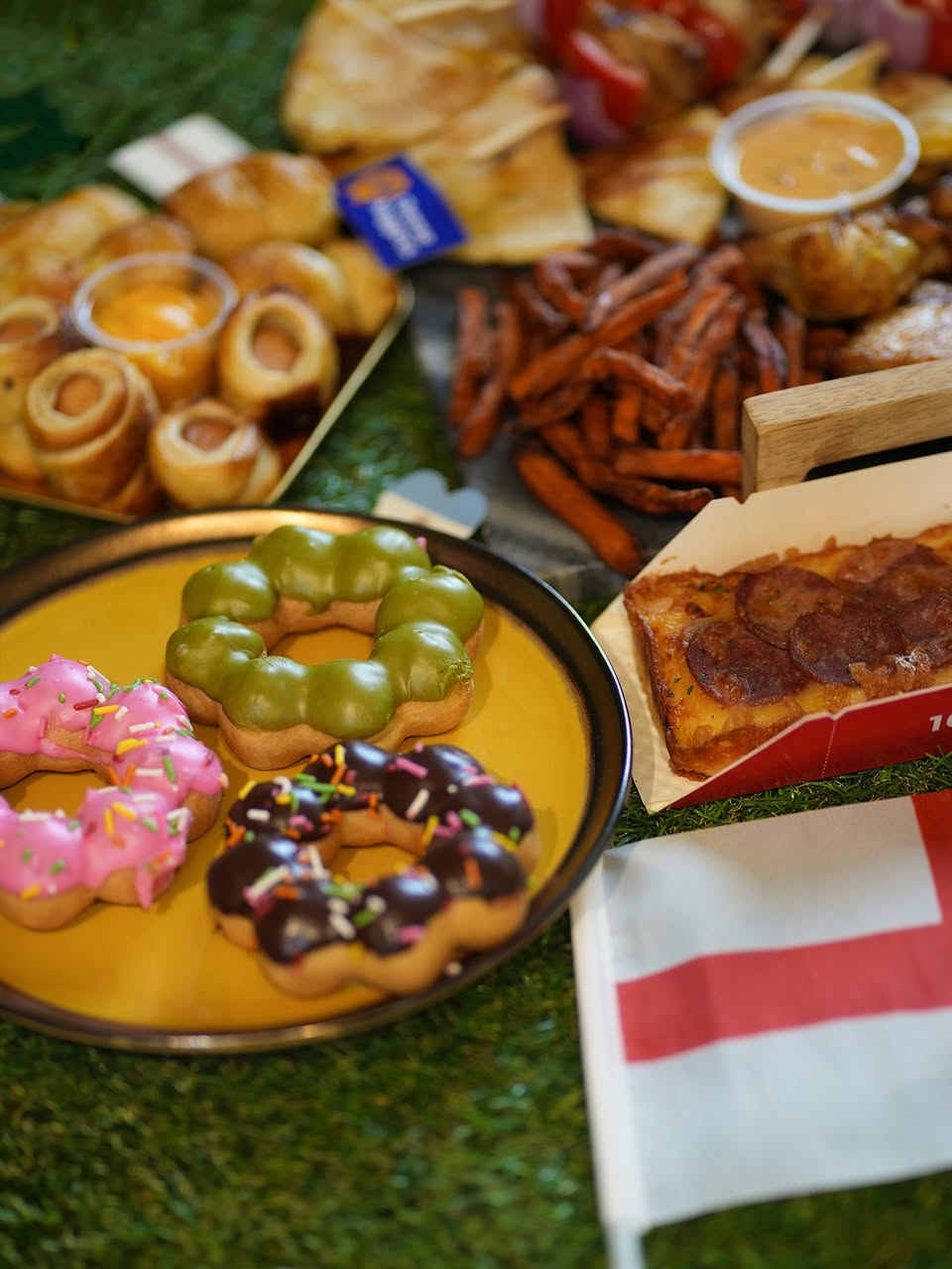 Pastries, donuts and pizza with English flag