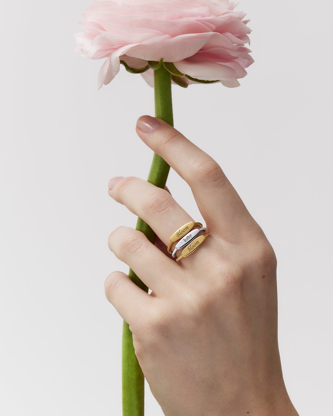 A collection of elegant Pandora engravable rings showcasing personalized details.