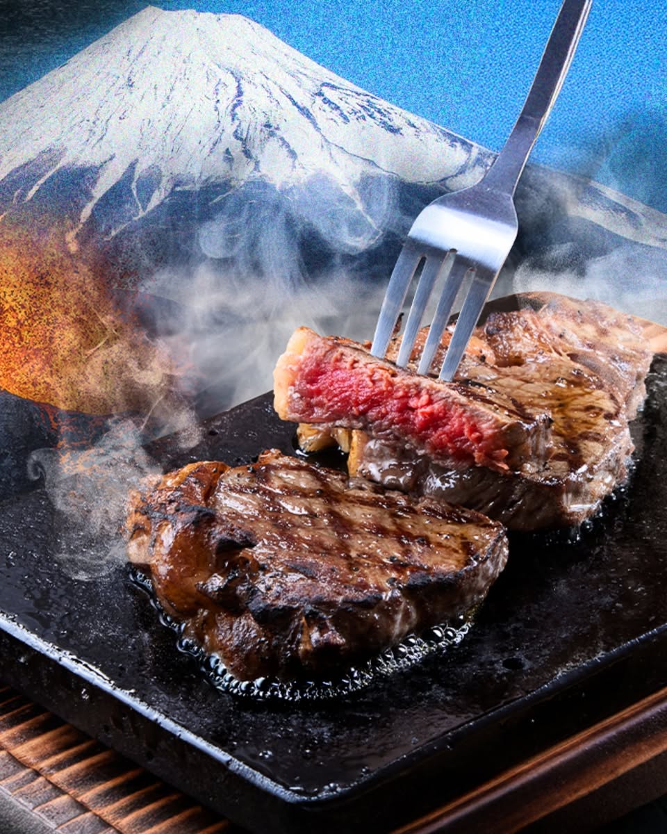 A close-up view of a succulent, juicy steak.